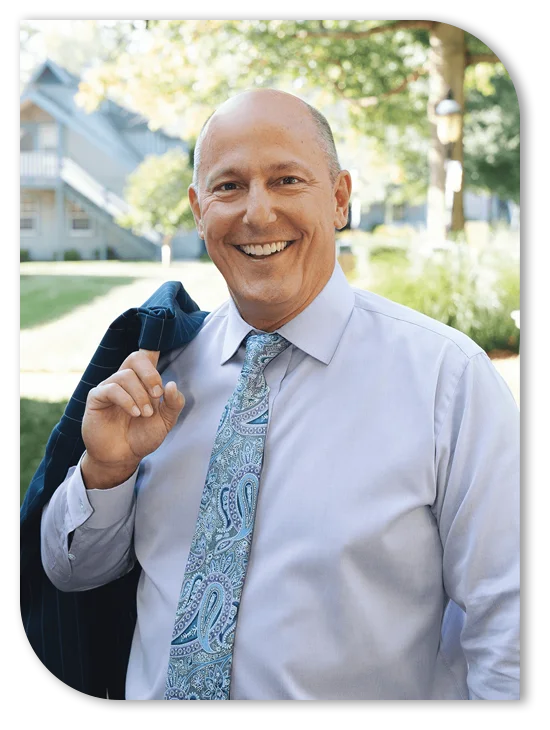 Dr. Glenn Loebig professionally dressed for a photo shoot